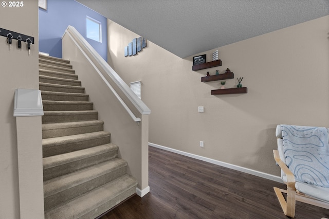15574 Bachelor Ave, Sandy, OR 97055 - staircase with wood finished floors and a textured ceiling
