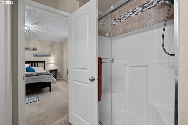 15574 Bachelor Ave, Sandy, OR 97055 - ensuite bathroom with a shower stall and a textured ceiling