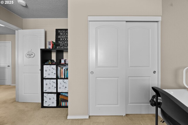 15574 Bachelor Ave, Sandy, OR 97055 - bedroom with carpet flooring, a closet, and a textured ceiling
