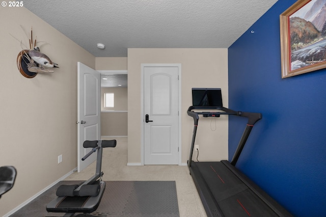 15574 Bachelor Ave, Sandy, OR 97055 - exercise room with a textured ceiling and light colored carpet