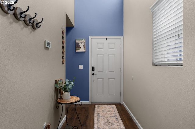 15574 Bachelor Ave, Sandy, OR 97055 - doorway to outside with dark wood-style flooring and baseboards