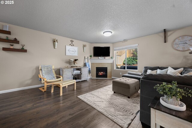 15574 Bachelor Ave, Sandy, OR 97055 - living area with a textured ceiling, wood finished floors, and a fireplace