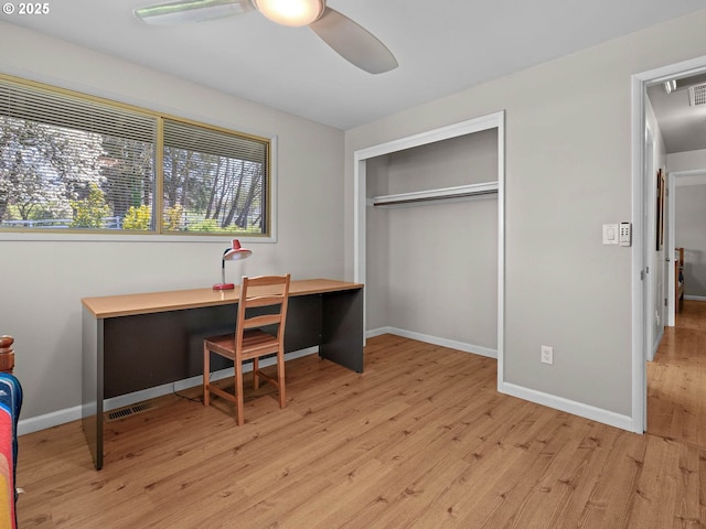 6229 NW Skyline Blvd, Portland, OR 97229 - bedroom with baseboards, a closet, visible vents, and light wood-style flooring