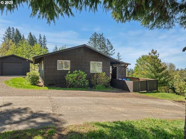 6229 NW Skyline Blvd, Portland, OR 97229 - view of side of home with crawl space, an outbuilding, and a garage