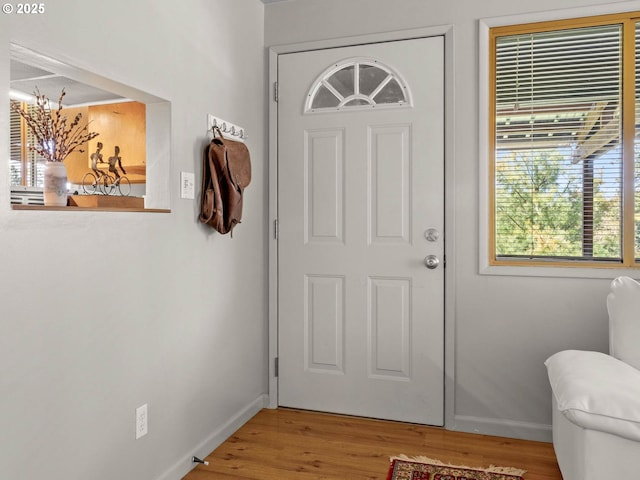 6229 NW Skyline Blvd, Portland, OR 97229 - entryway featuring baseboards and wood finished floors