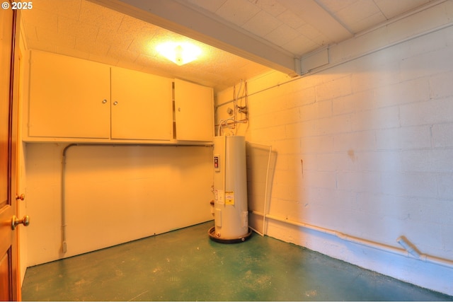 basement with water heater and concrete block wall