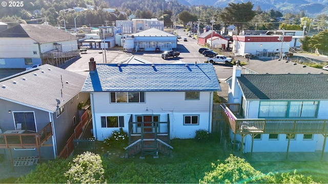 aerial view of residential area with mountains