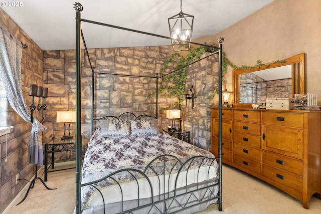 bedroom featuring light carpet and a chandelier