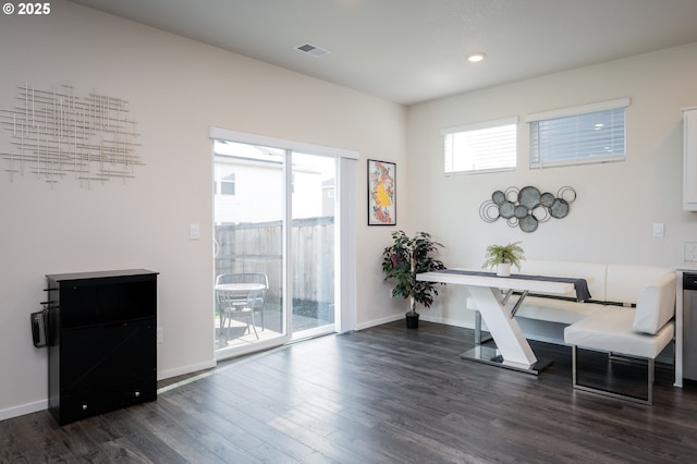 office featuring dark wood finished floors, visible vents, recessed lighting, and baseboards