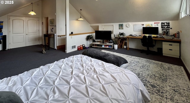 bedroom featuring carpet floors, baseboards, visible vents, and vaulted ceiling