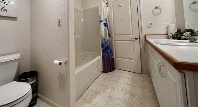 full bathroom featuring toilet, vanity, baseboards, tile patterned floors, and shower / bath combination with curtain