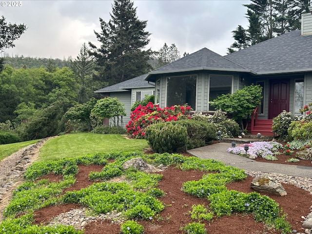 3115 Deer Trail Ln, Medford, OR 97501 - ranch-style house featuring a garage, a chimney, a carport, a front lawn, and brick siding