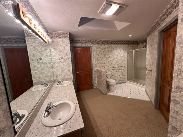 3115 Deer Trail Ln, Medford, OR 97501 - unfurnished bedroom with carpet, a textured ceiling, a closet, and visible vents