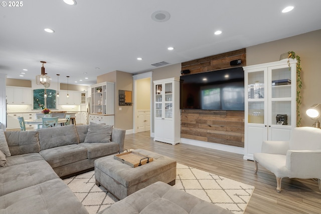 11712 Finnegans Way, Oregon City, OR 97045 - living area featuring light wood-type flooring and recessed lighting