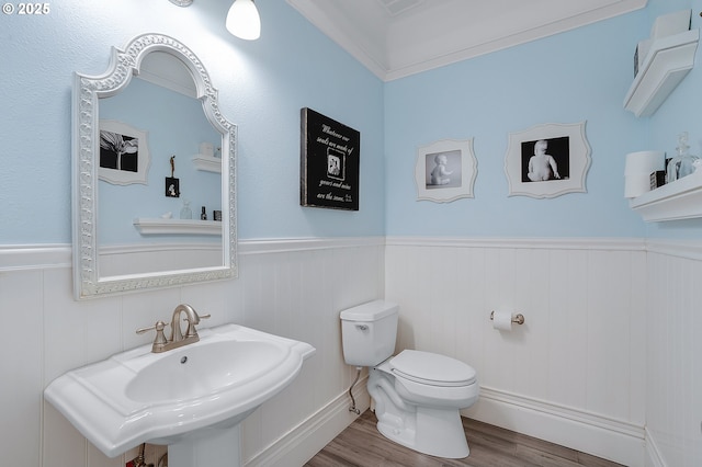 11712 Finnegans Way, Oregon City, OR 97045 - bathroom with wood finished floors and a wainscoted wall