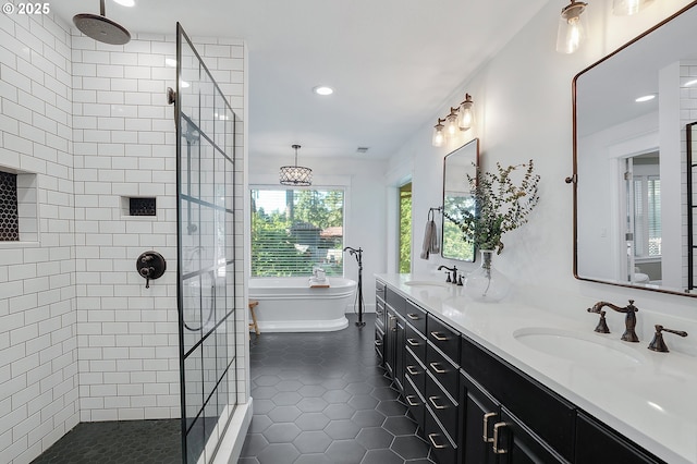 11712 Finnegans Way, Oregon City, OR 97045 - full bath with tile patterned floors, tiled shower, double vanity, a soaking tub, and recessed lighting
