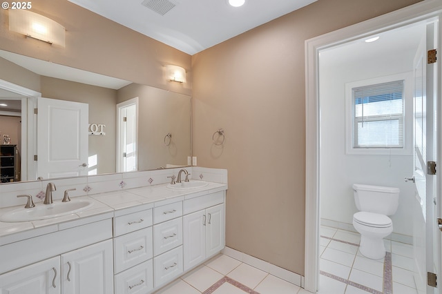 11712 Finnegans Way, Oregon City, OR 97045 - full bath featuring double vanity, tile patterned floors, and recessed lighting