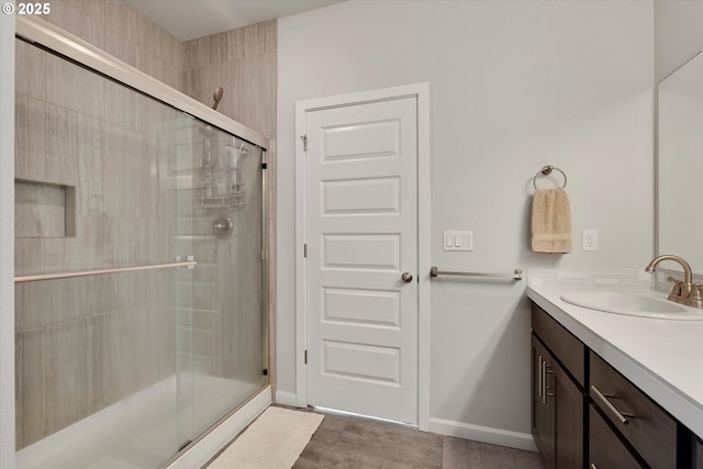 bathroom featuring vanity and walk in shower