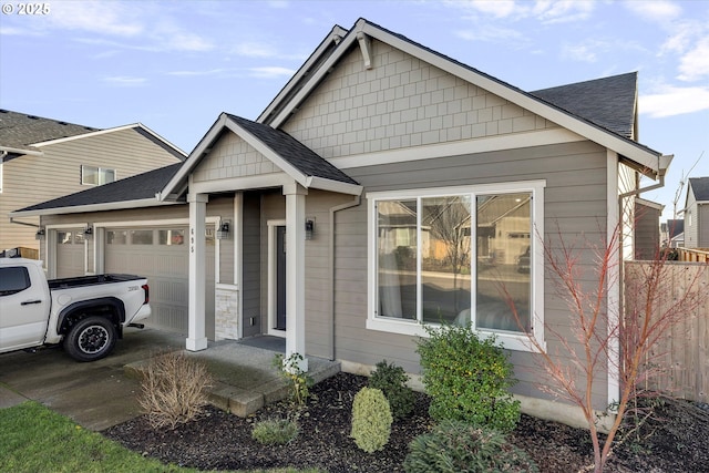 view of front of property featuring a garage