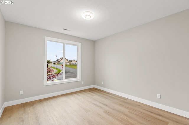 empty room featuring light hardwood / wood-style flooring