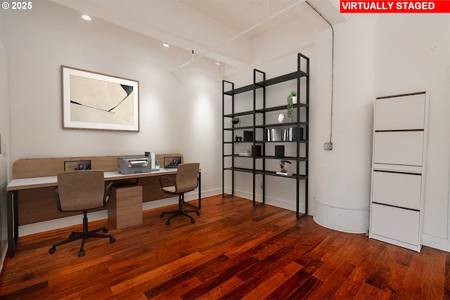 office space with baseboards and wood finished floors