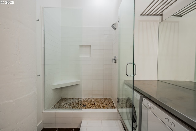 bathroom featuring a shower stall