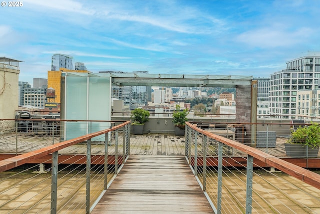 dock area featuring a city view and a balcony