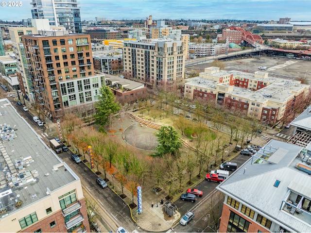 drone / aerial view featuring a city view