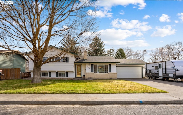 1524 SW 44th St, Pendleton, OR 97801 - split level home featuring driveway, an attached garage, a chimney, and crawl space