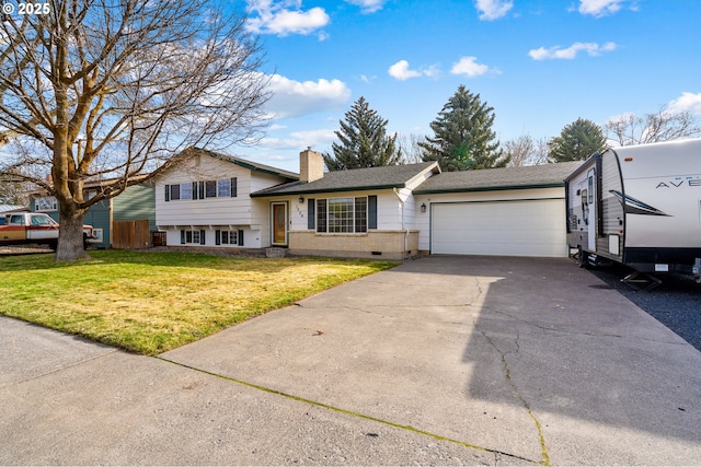 1524 SW 44th St, Pendleton, OR 97801 - split level home featuring a chimney, crawl space, driveway, a garage, and a front lawn