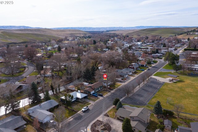 1524 SW 44th St, Pendleton, OR 97801 - aerial overview of property's location featuring nearby suburban area and mountains