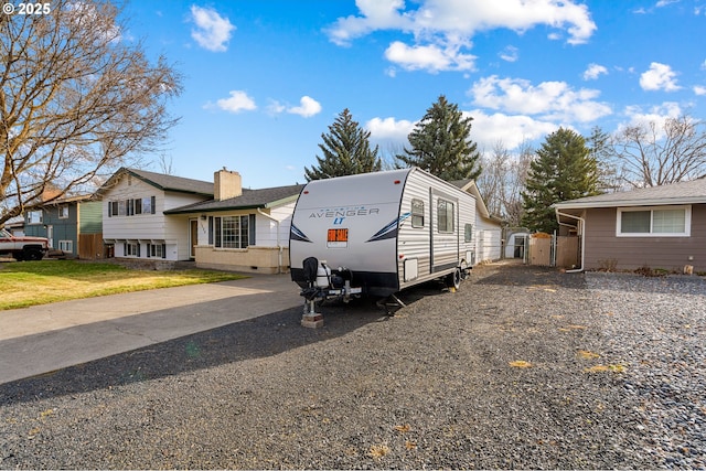 1524 SW 44th St, Pendleton, OR 97801 - tri-level home with a chimney and driveway