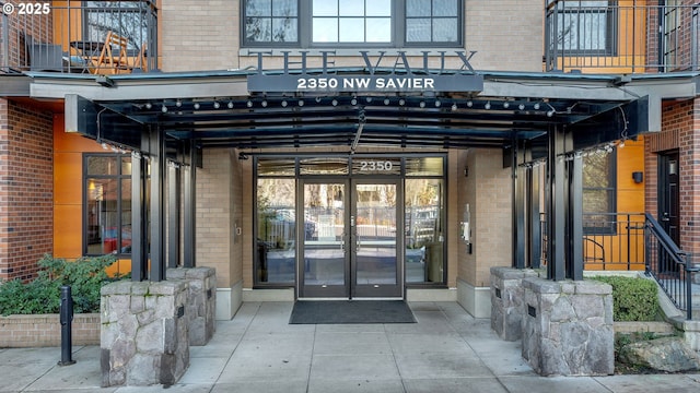 property entrance featuring french doors