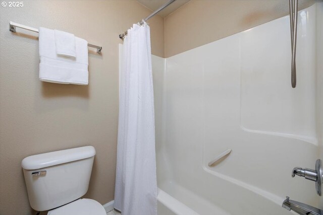 249 NW Mandi St, Hillsboro, OR 97124 - bathroom featuring toilet and shower / tub combo with curtain