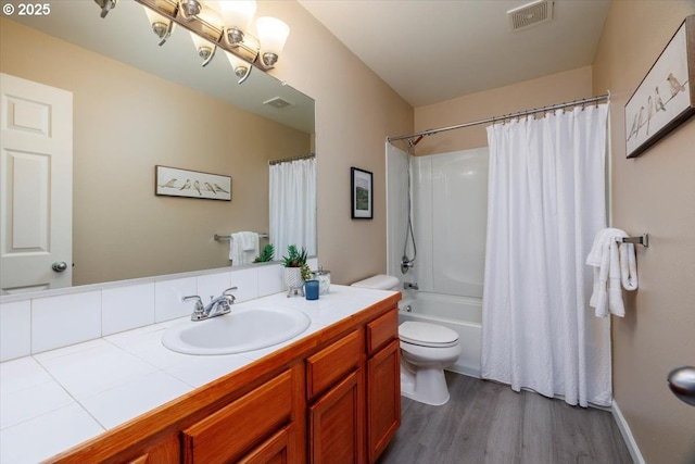 249 NW Mandi St, Hillsboro, OR 97124 - full bathroom with wood finished floors, toilet, vanity, shower / bath combination with curtain, and a chandelier