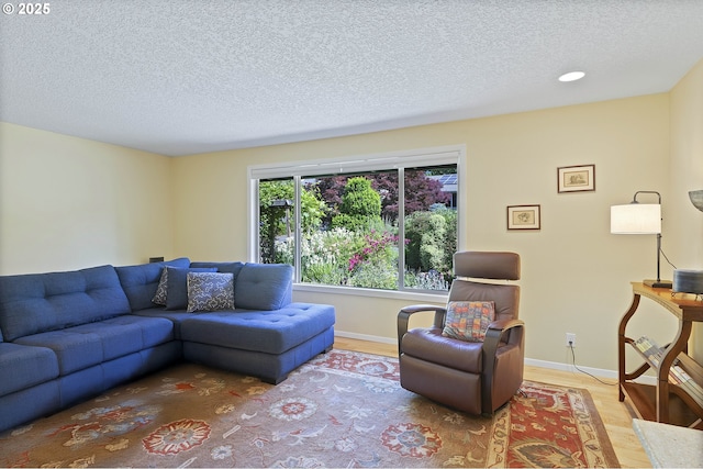 2320 SW Canby Ct, Portland, OR 97219 - living area featuring wood finished floors and a textured ceiling