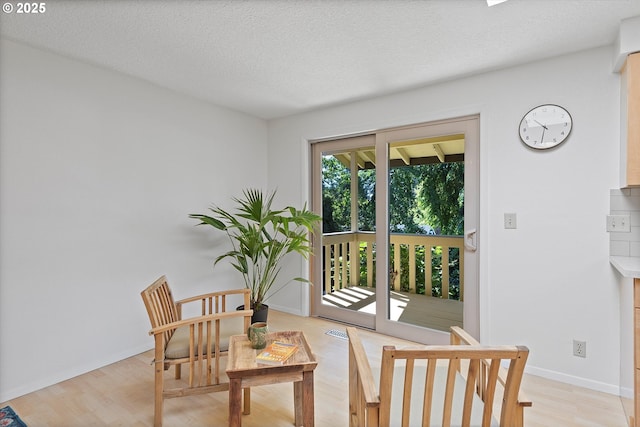 2320 SW Canby Ct, Portland, OR 97219 - sitting room with light wood-type flooring and a textured ceiling