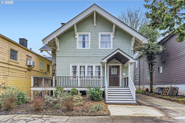 view of front of house featuring cooling unit