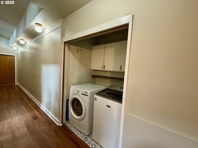 892 S 55th Pl, Springfield, OR 97478 - laundry room with washing machine and dryer, dark wood-style flooring, and baseboards