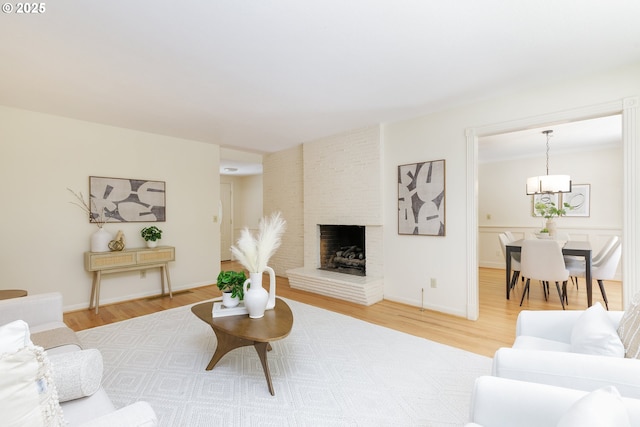 17243 Fernwood Dr, Lake Oswego, OR 97034 - living room with light wood-style floors, a fireplace, and baseboards