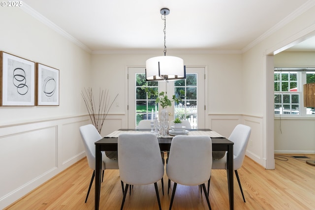 17243 Fernwood Dr, Lake Oswego, OR 97034 - dining space with light wood-type flooring, plenty of natural light, a chandelier, ornamental molding, and wainscoting