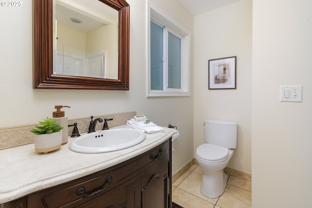 17243 Fernwood Dr, Lake Oswego, OR 97034 - full bath featuring vanity, toilet, tile patterned floors, and baseboards