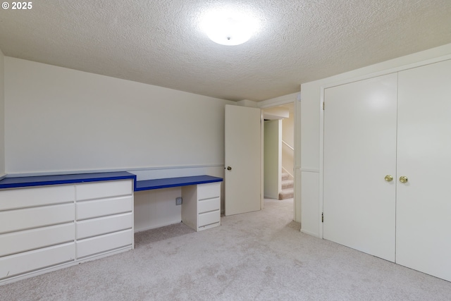 17243 Fernwood Dr, Lake Oswego, OR 97034 - unfurnished bedroom featuring carpet flooring and a textured ceiling