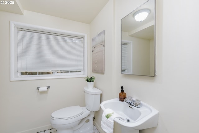 17243 Fernwood Dr, Lake Oswego, OR 97034 - bathroom with toilet, baseboards, and a sink
