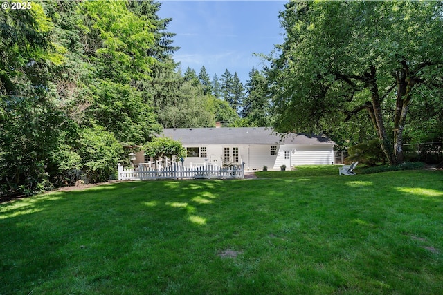 17243 Fernwood Dr, Lake Oswego, OR 97034 - rear view of house with a lawn, a chimney, and a patio area