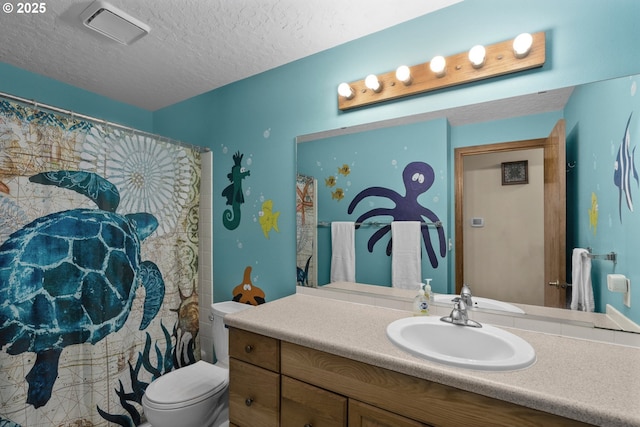 1415 SE 52nd Ave, Hillsboro, OR 97123 - bathroom featuring a textured ceiling, vanity, toilet, and curtained shower