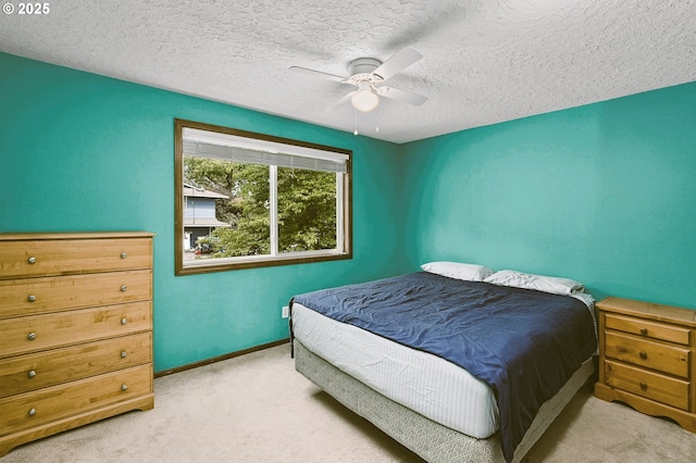 1415 SE 52nd Ave, Hillsboro, OR 97123 - carpeted bedroom featuring a textured ceiling, a ceiling fan, and baseboards