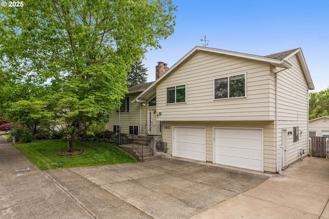 1415 SE 52nd Ave, Hillsboro, OR 97123 - view of front of house with a chimney, an attached garage, and driveway