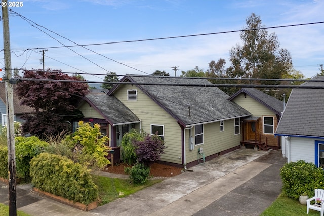 1006 Stillwell Ave, Tillamook, OR 97141 - view of front of property with roof with shingles and driveway