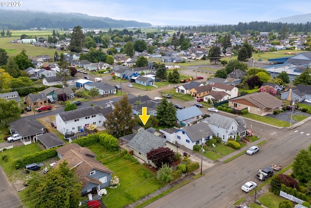 1006 Stillwell Ave, Tillamook, OR 97141 - aerial view of residential area with a mountain backdrop